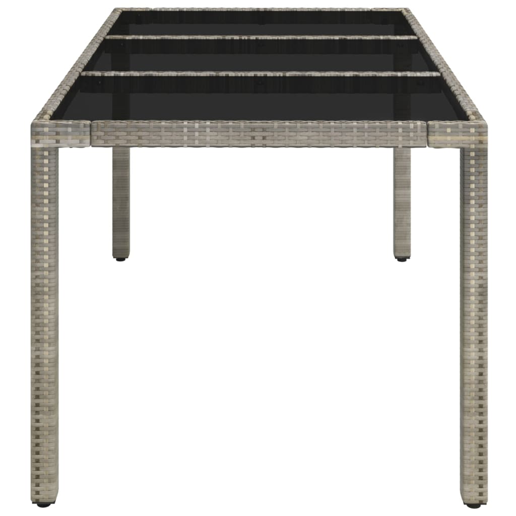 vidaXL Table de jardin dessus en verre Gris 150x90x75cm Résine tressée